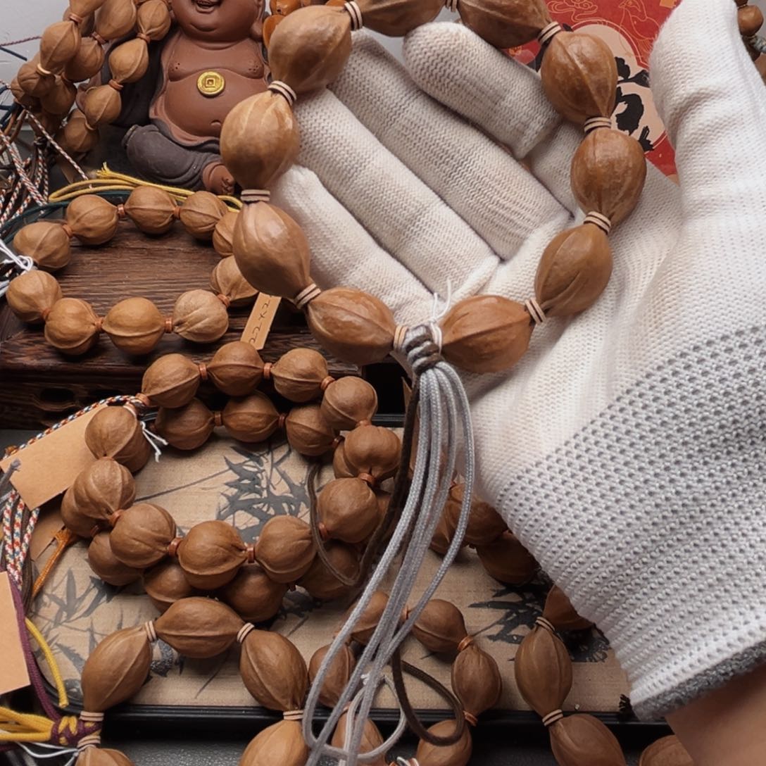 告***轮手串橄榄核17.24梅林铁核