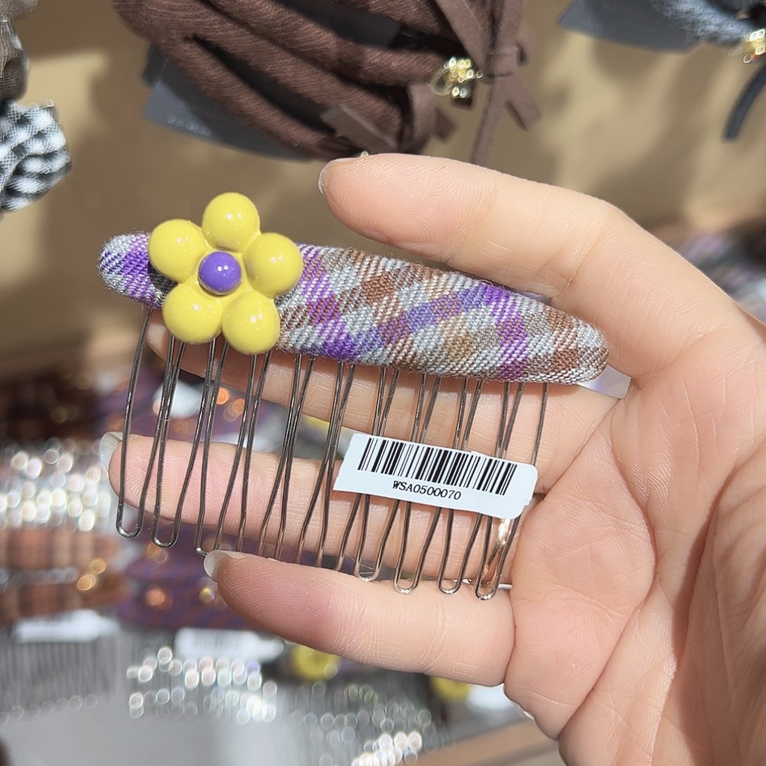 非金属黄色小花插梳