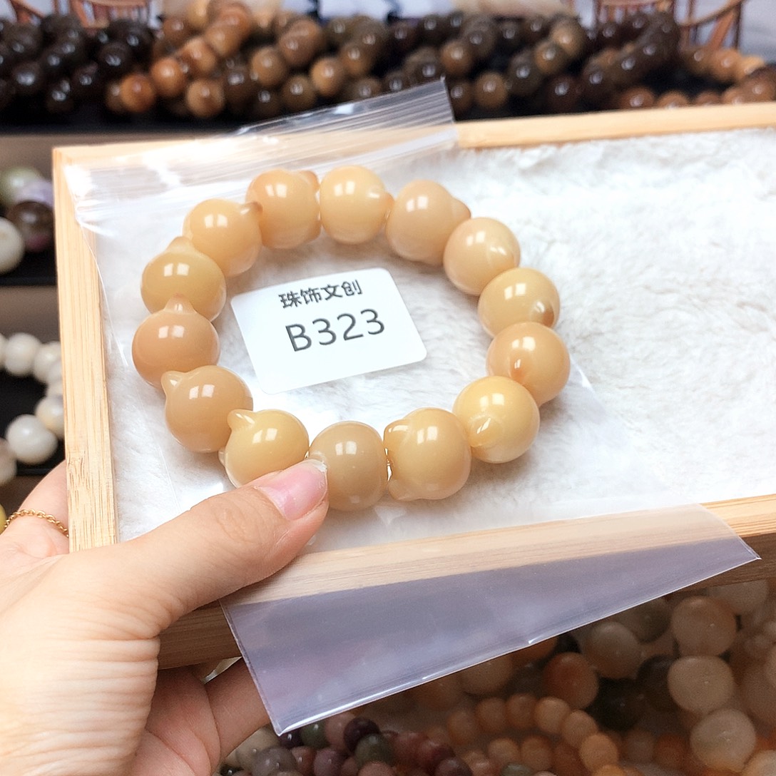 仰***。吊坠菩提根/象牙果B323