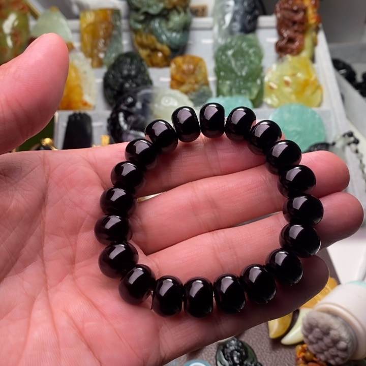 蛇纹石玉手串未镶嵌陈**调