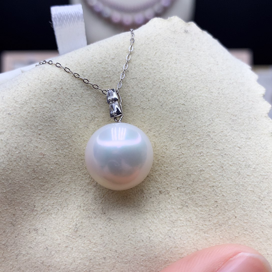 荣***工颈饰淡水珍珠18K金镶嵌