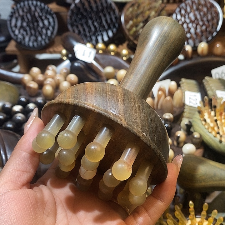 梦****紫光檀绿檀19齿按摩梳