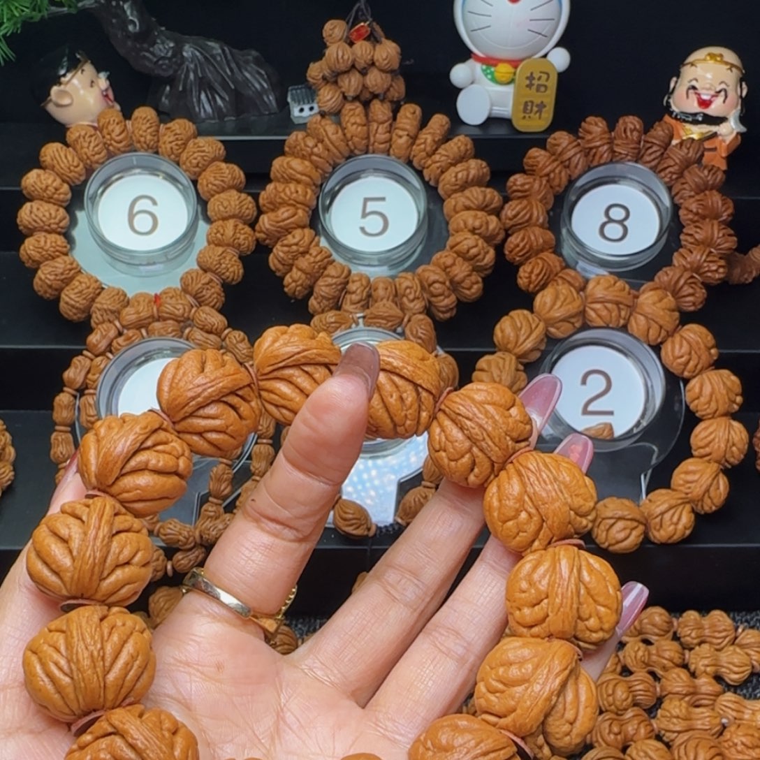 桃核吊坠霸王龙手串