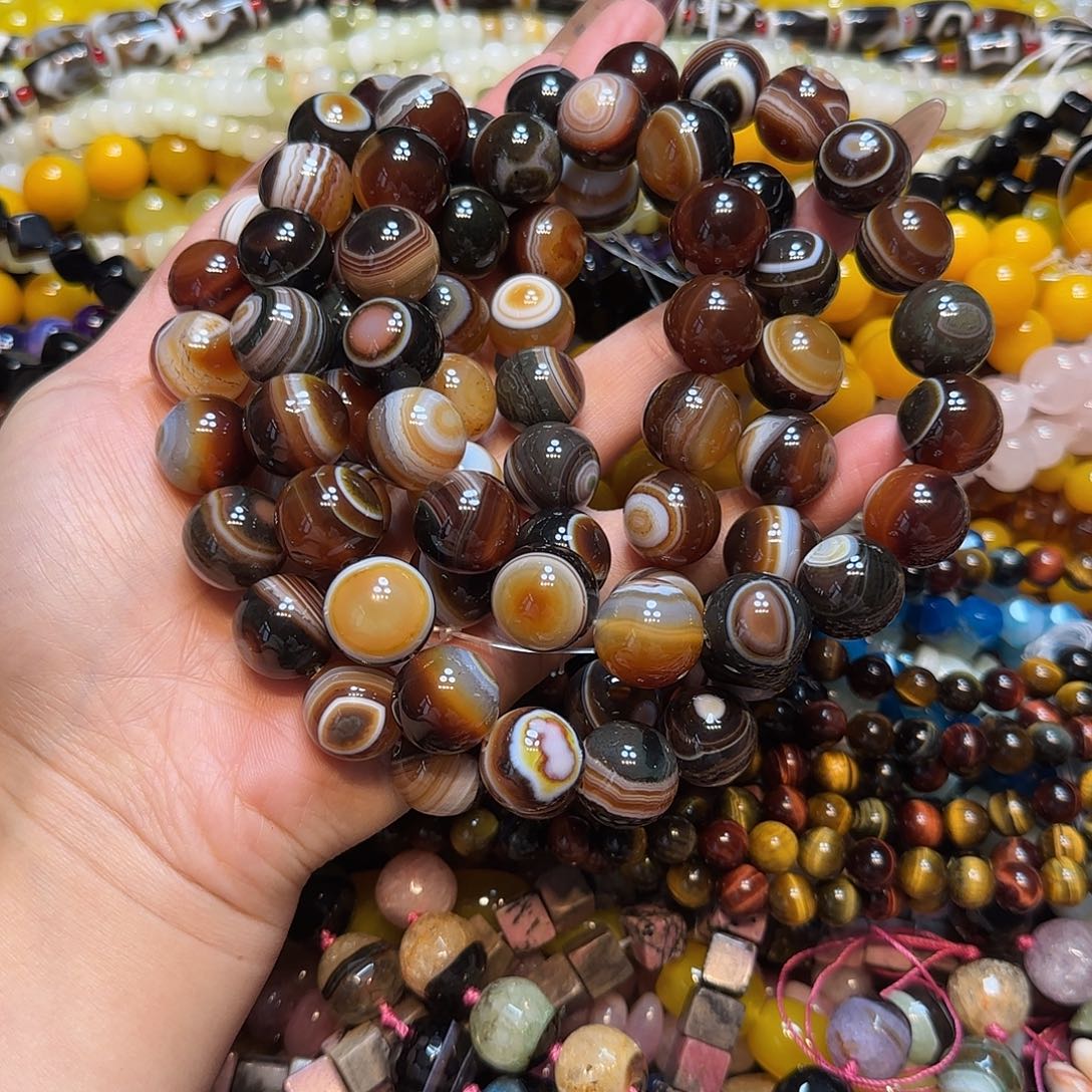 玛瑙/玉髓未镶嵌珠宝半成品16mm板眼蚕丝眼睛一条