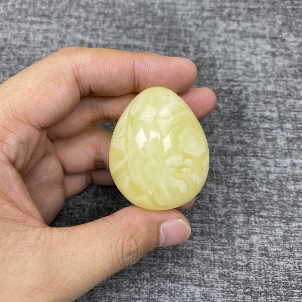天然原矿琥珀蜜蜡俄料奶咖瓷白水滴吊坠25.3克