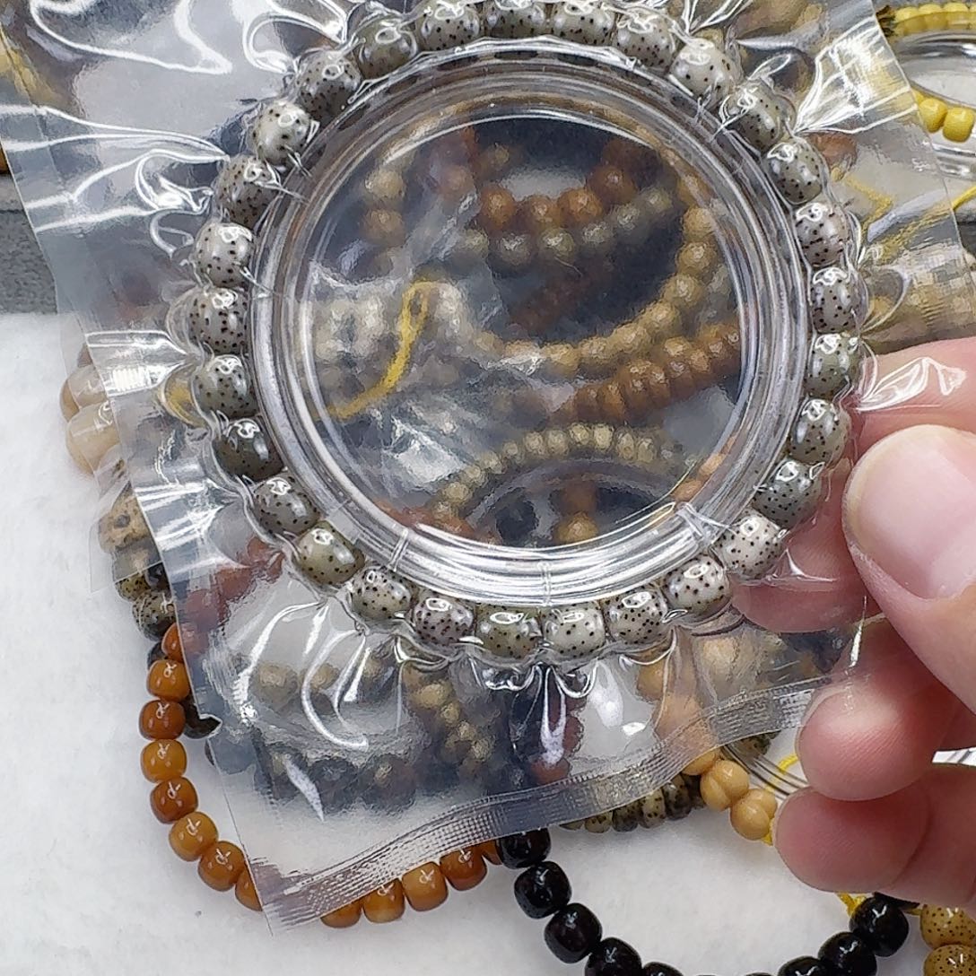 星月菩提手串55傲世半臂星月菩提河豚8×7单圈