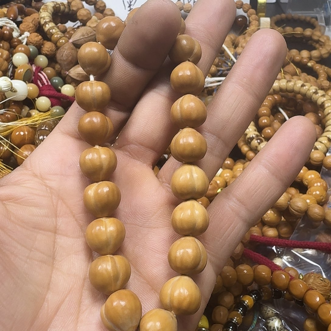 海***猴头核桃吊坠微瑕屁桃