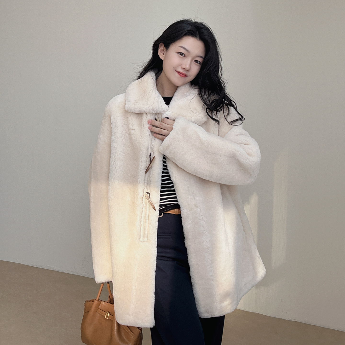 真皮毛一体羊皮羊羔毛进口海宁草外套女2025年冬新款中长款美利奴