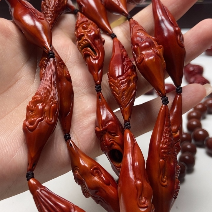 江***串橄榄核吊坠橄榄核