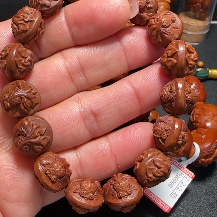 橄榄核手串M**.年年有余