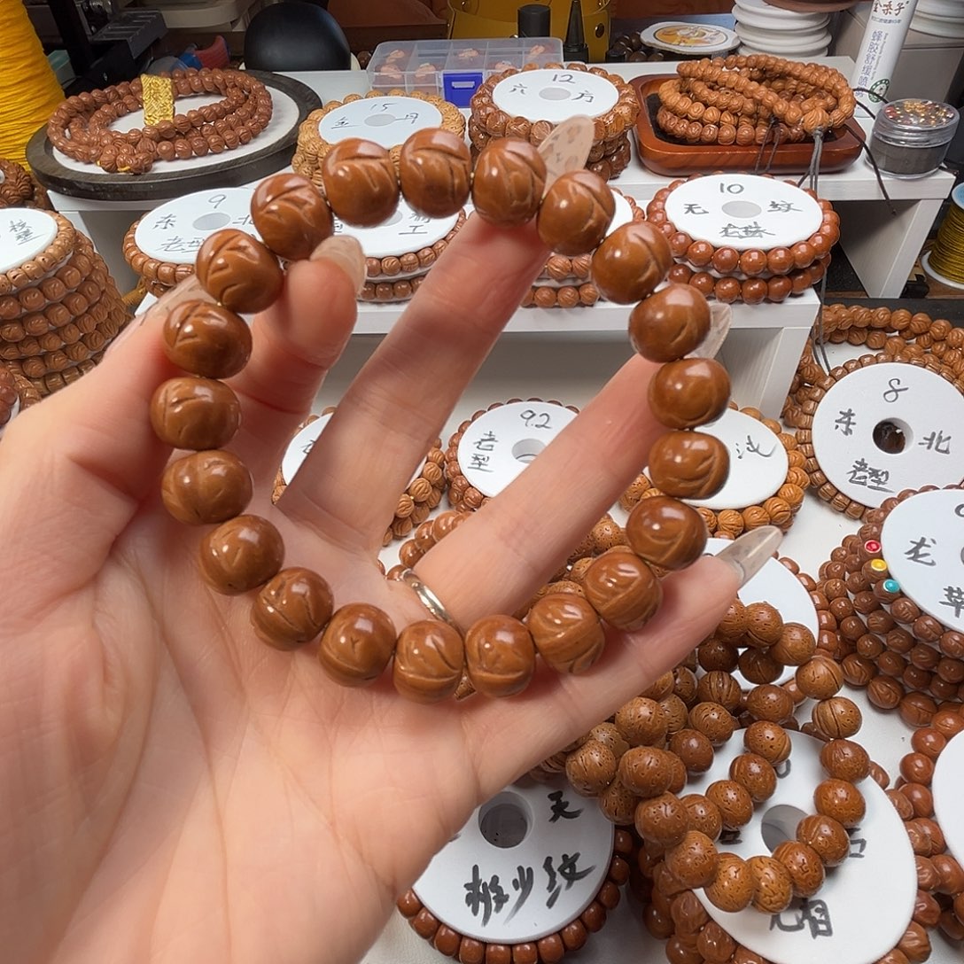 雁***归桃核手串桃核光珠