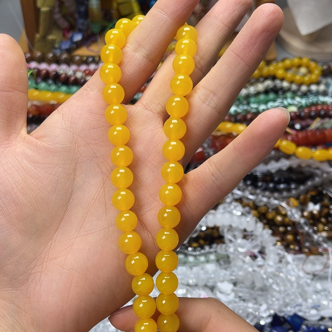 玛瑙/玉髓未镶嵌珠宝半成品卡10黄玛圆珠一条