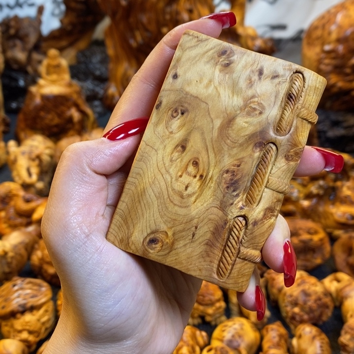 崖柏一本万利手把件