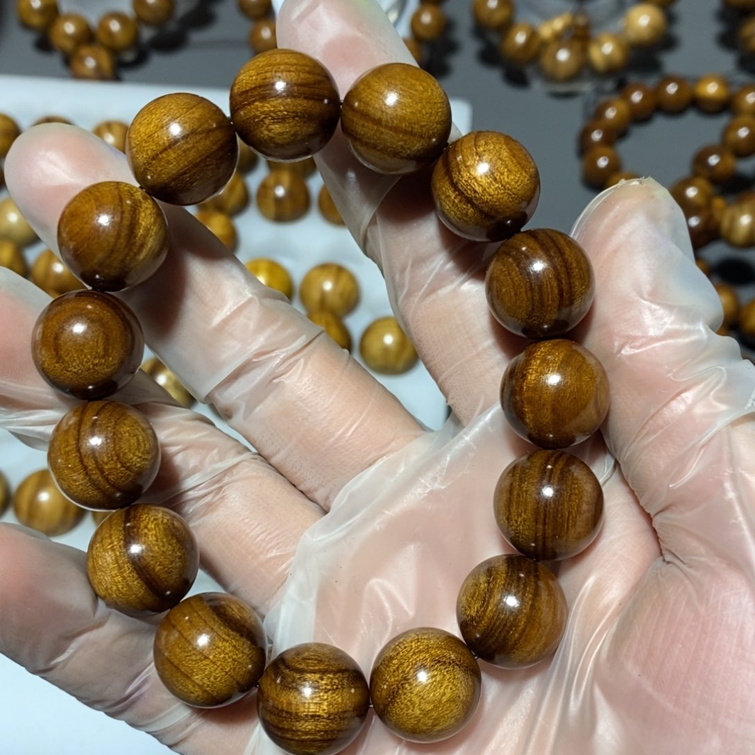 金丝楠买***券小叶1.5手串