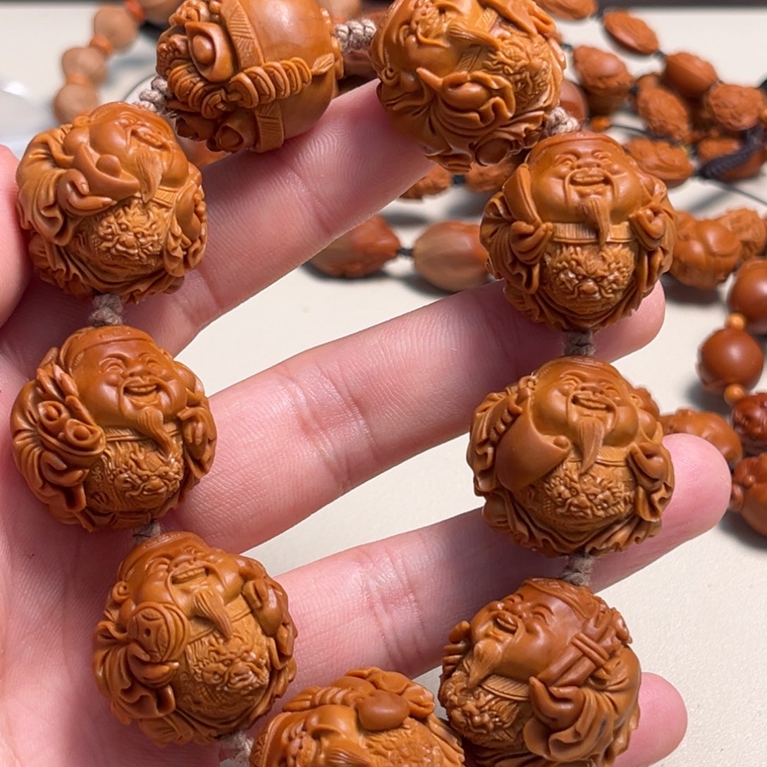 橄榄核吊坠人*龙财