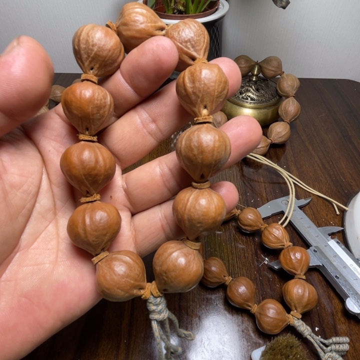 徐***.橄榄核吊坠橄榄核手串