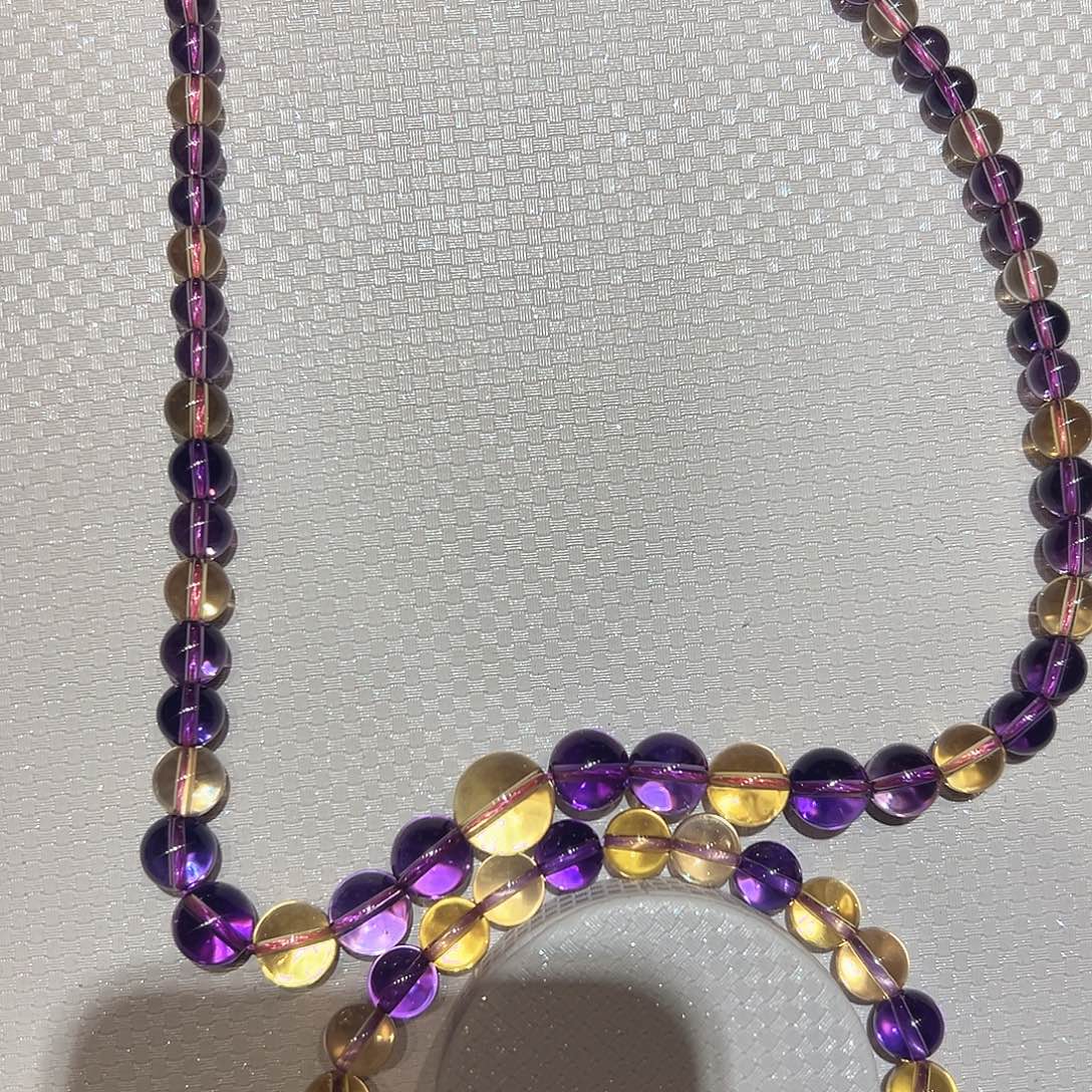 妞***妞未镶嵌水晶手串紫黄