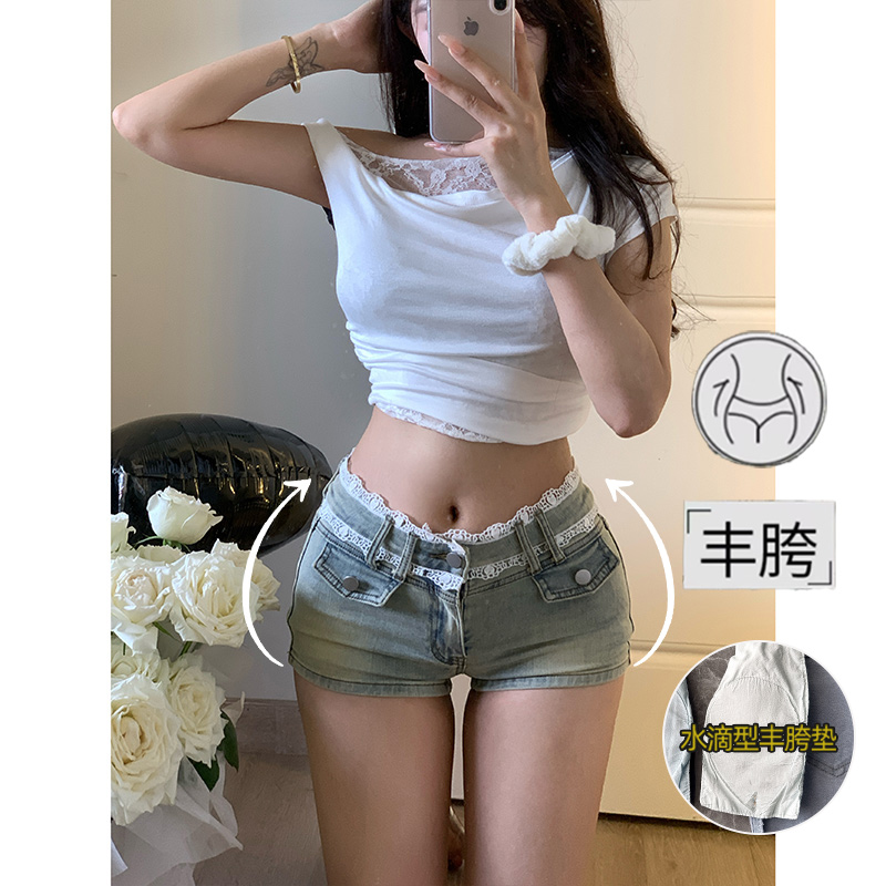 法式蕾丝拼接丰胯牛仔短裤女2025年冬季新款低腰紧身包臀热裤