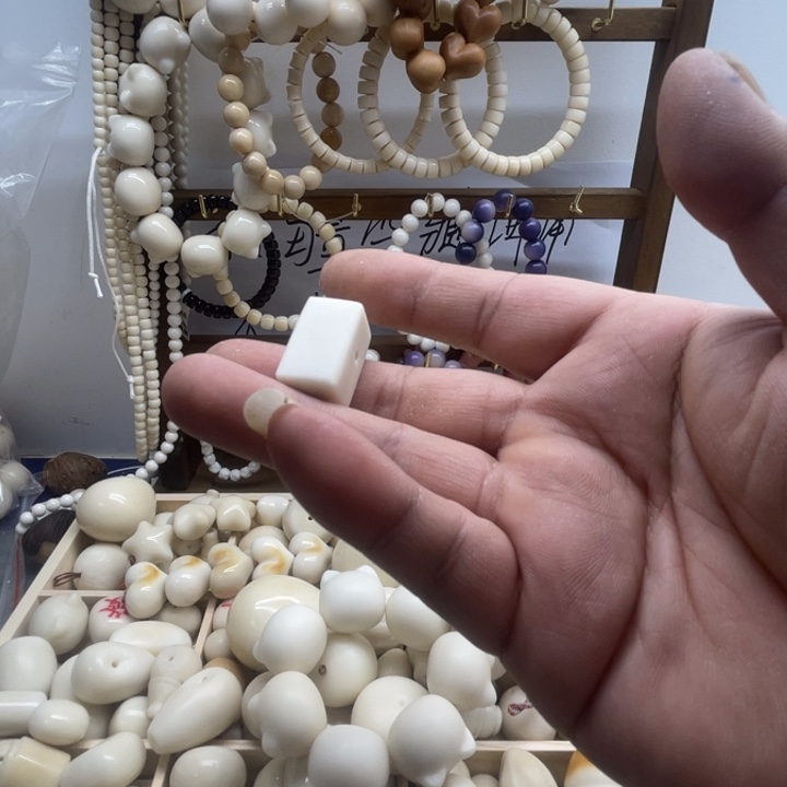 星***！象牙果雕刻一字三通