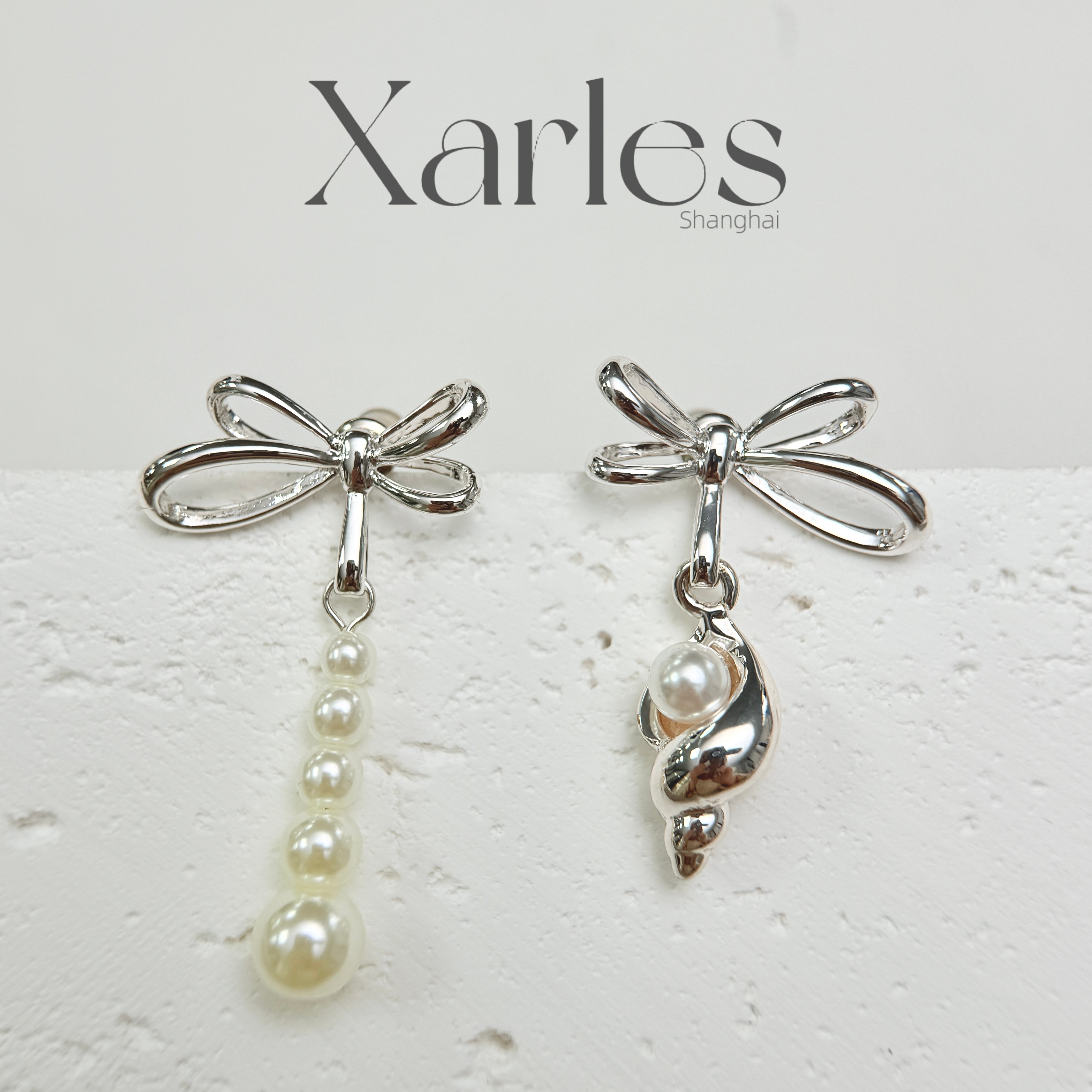 铜合金仿珍珠耳饰 蝴蝶结海螺AB款耳环E23511