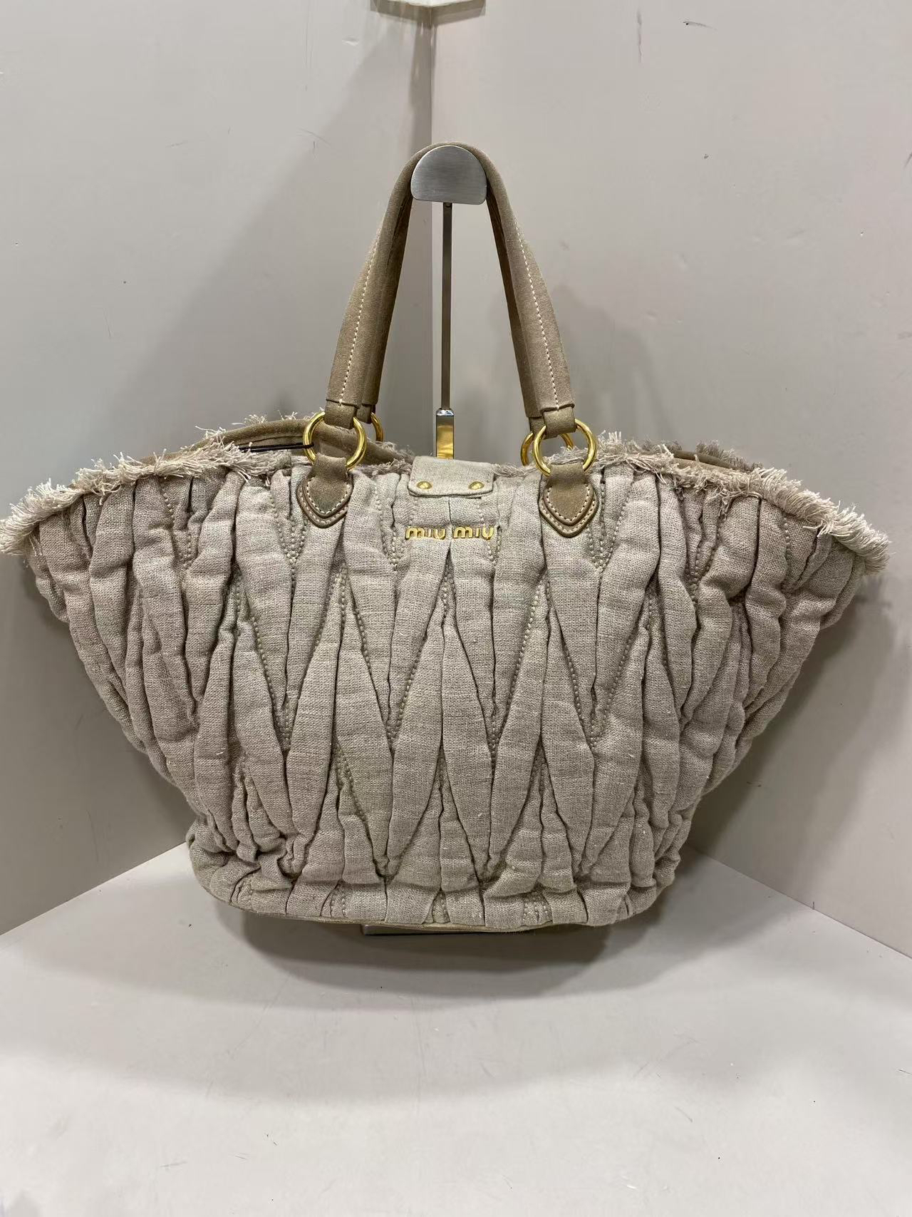 95新 MIU MIU/缪缪 【清】 1UF807 卡其色丹宁褶皱包