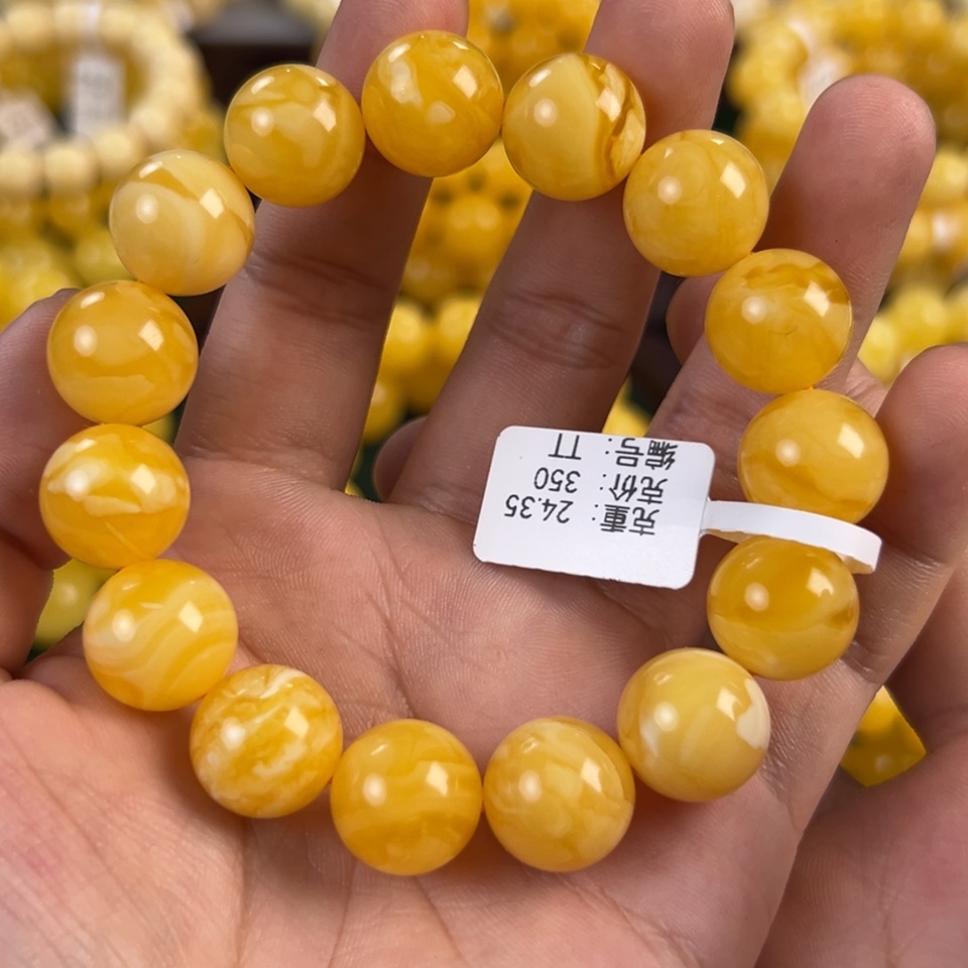琥珀未镶嵌手链24.35g焦皮同料圆珠14mm tt