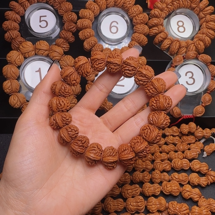 创***越手串桃核刺纹手串