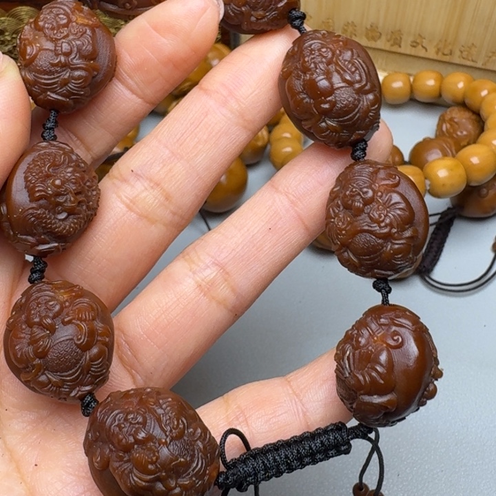 龍***寶橄榄核手串/手链财神