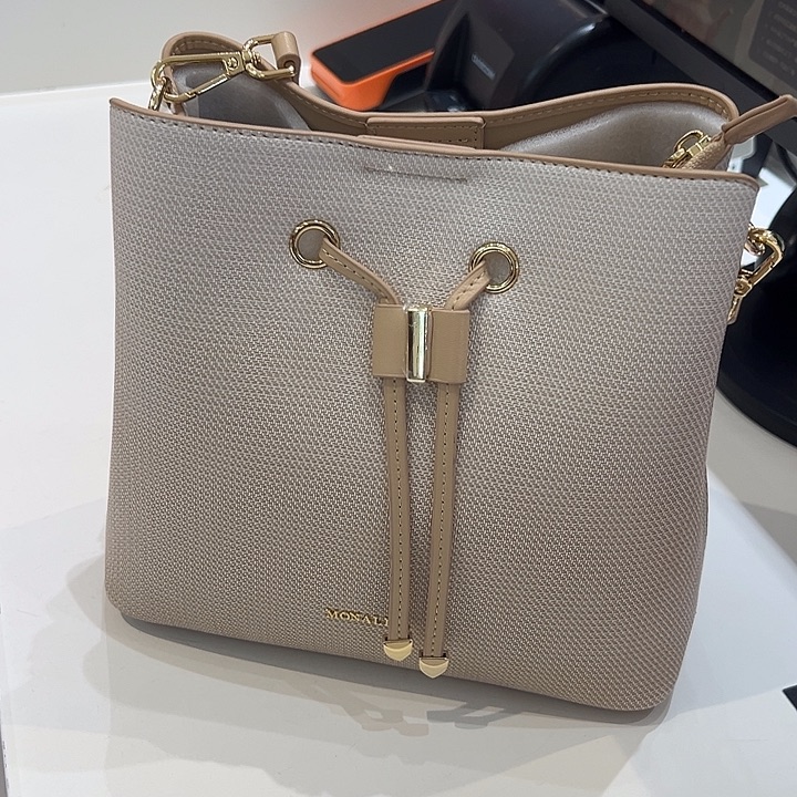 蚕丝聚氨酯蒙娜丽莎女包水桶