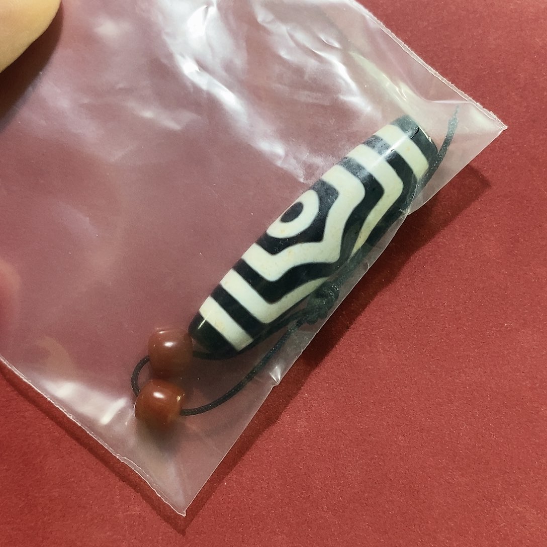 晓***荃玛瑙/玉髓未镶嵌颈饰行运三眼