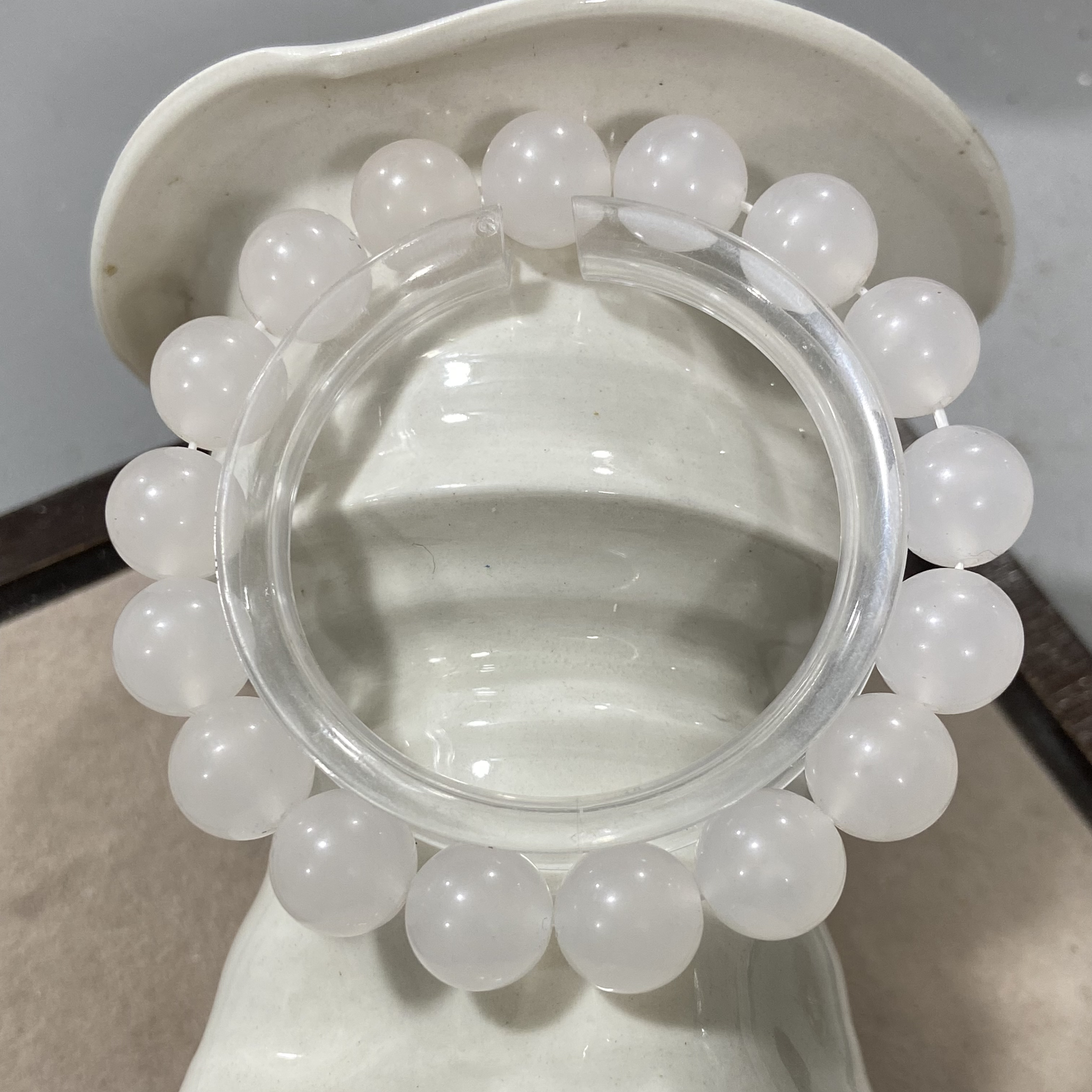 A166海云母（血沉宝）卡1.2单圈手串（紫光线太阳光照射变色）