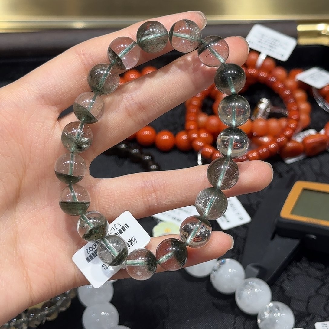 烟晶手串未镶嵌绿幽灵 带一颗红皮 