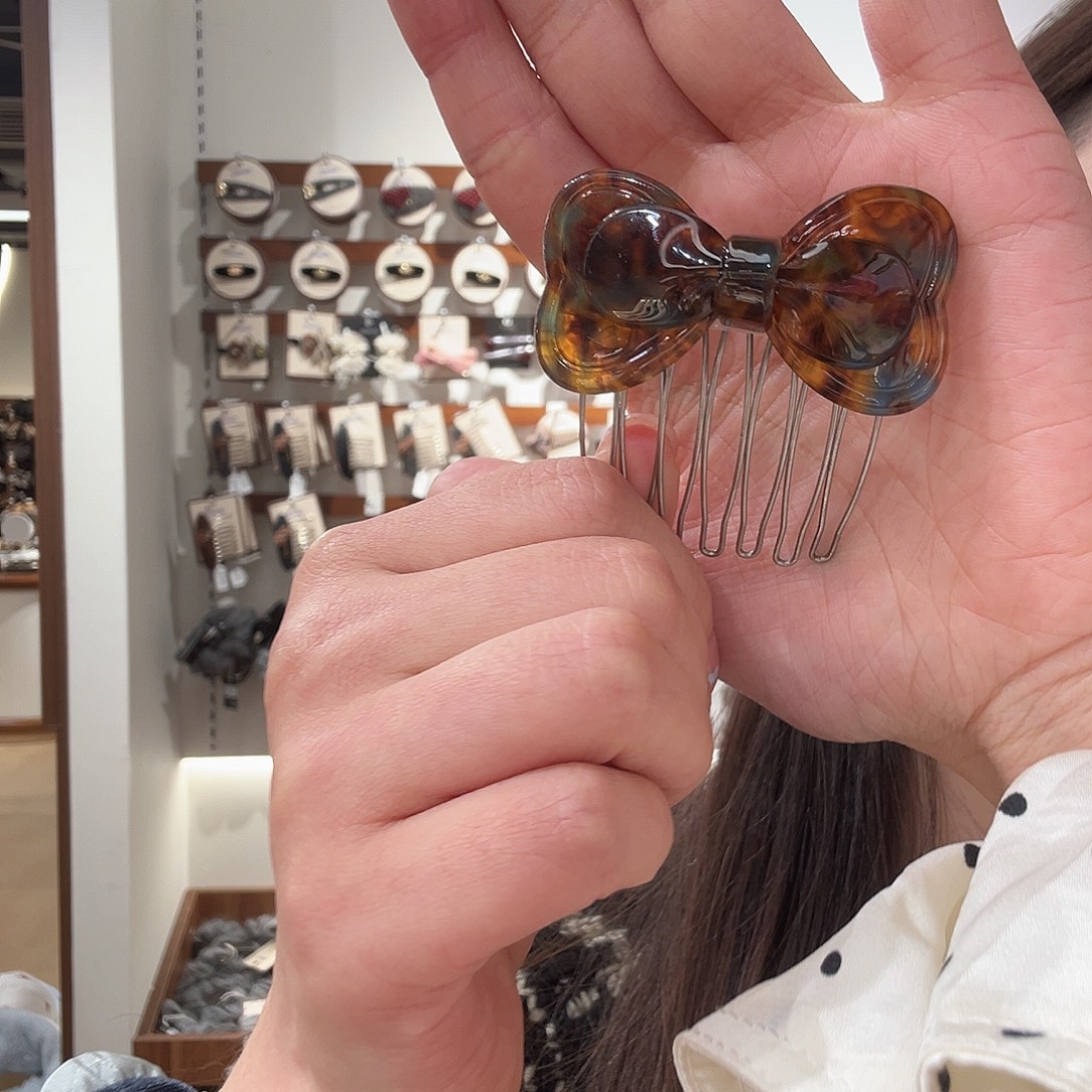 布艺铁合金蓝棕色插梳