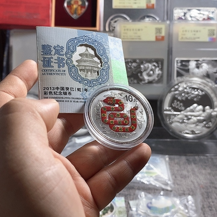纯银有瑕疵有氧化带证书13年彩银蛇一枚如图