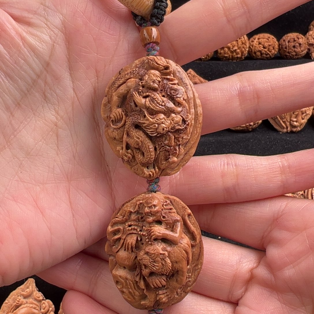 吊坠桃核桃核雕刻降龙伏虎手把件