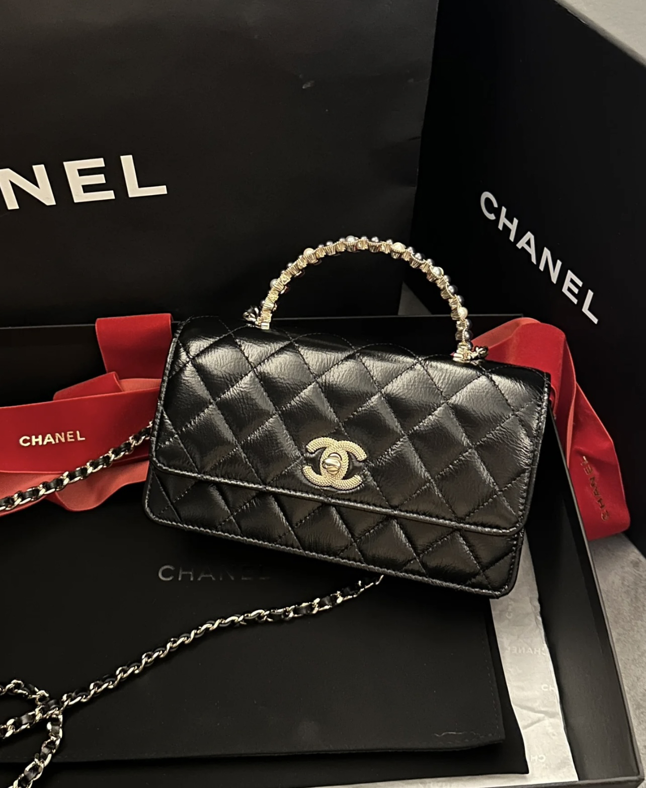 95新 Chanel/香奈儿 9763 黑金24P珍珠手柄风琴woc手提斜挎包芯片