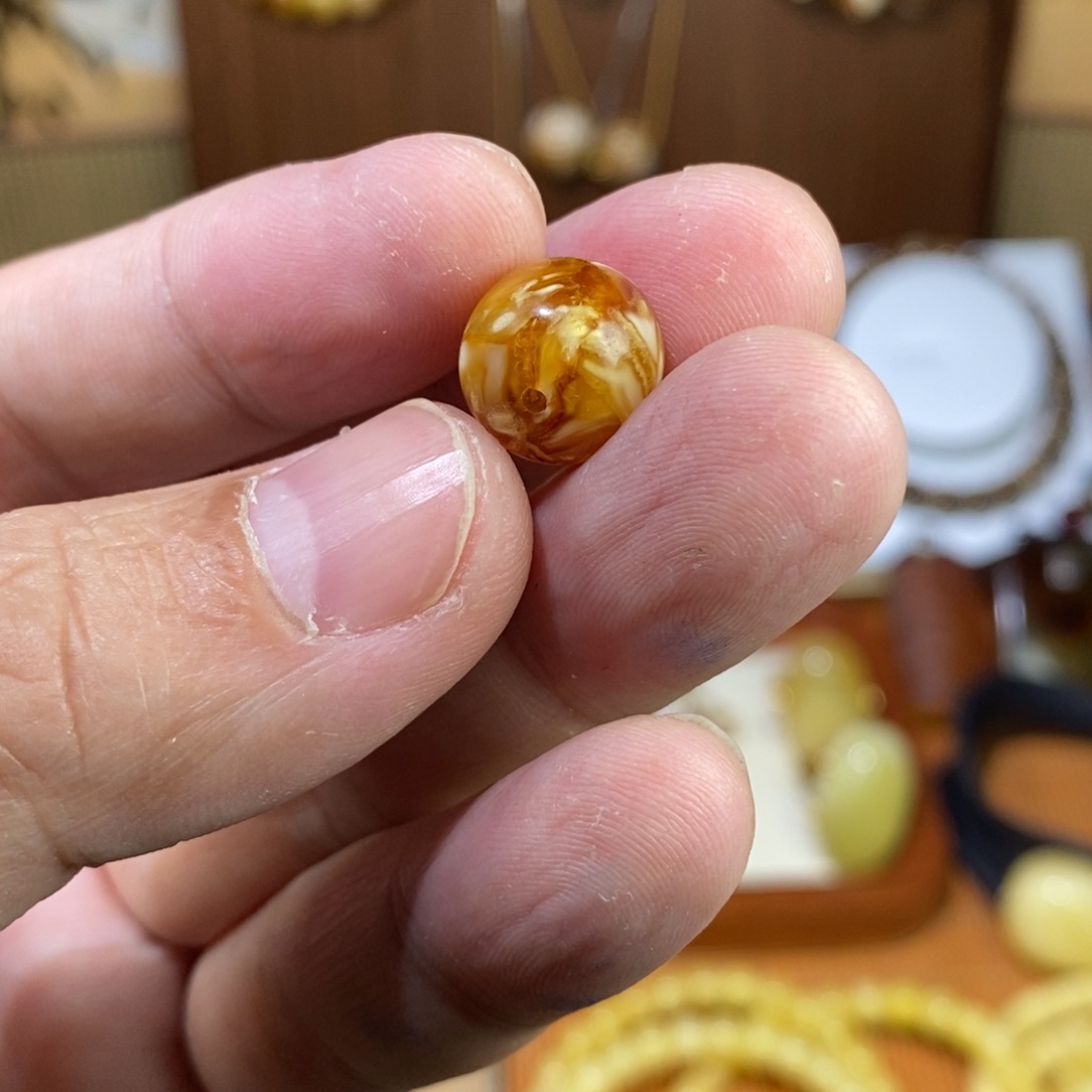 枫***。11+沁色精工圆珠一颗