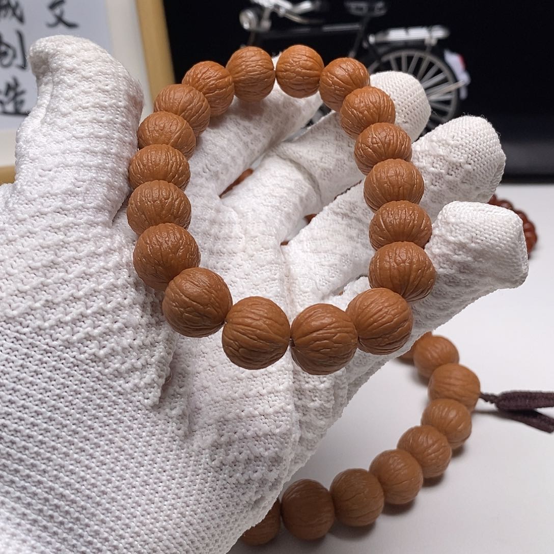 猴头核桃手串橋*猴头核桃原皮凤羽