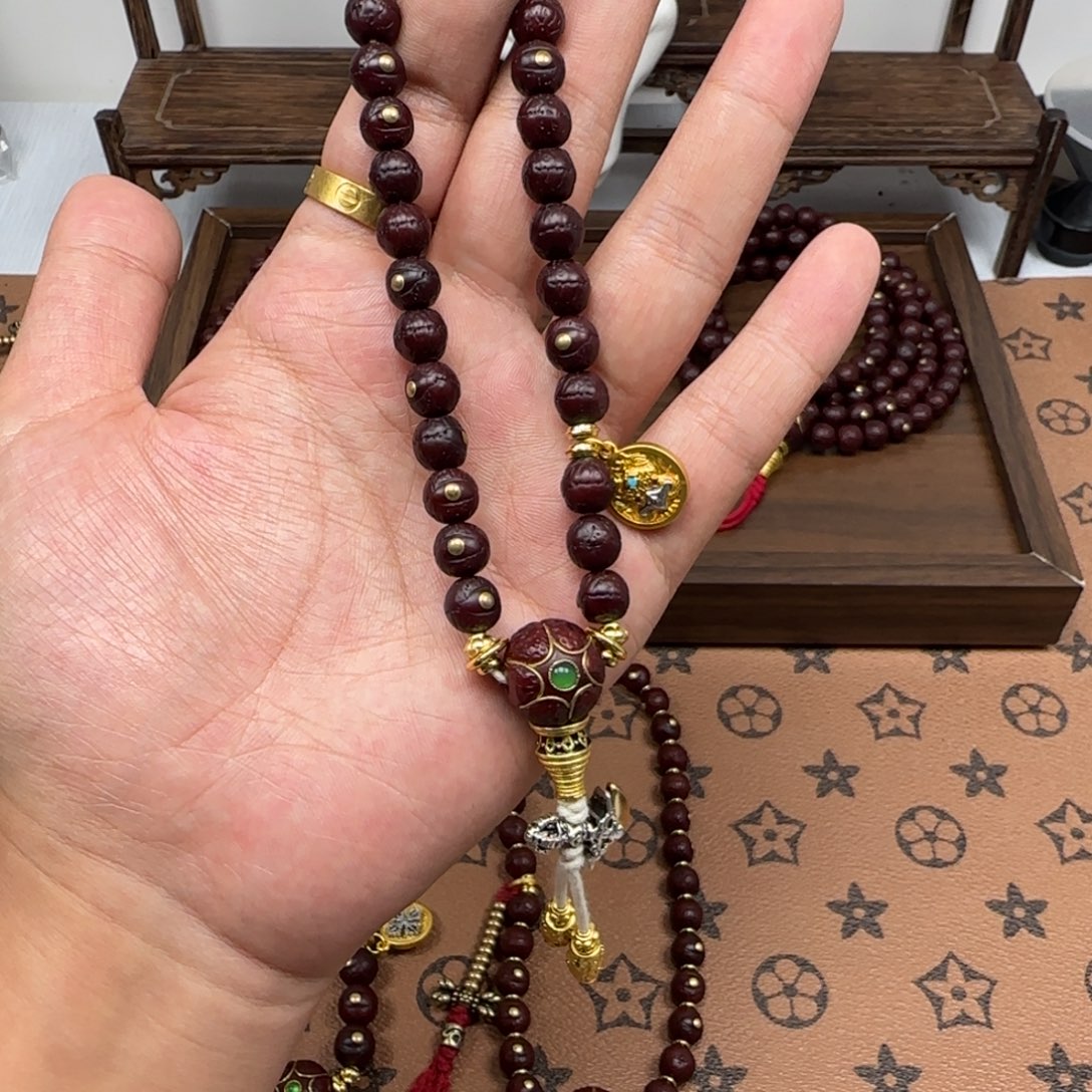 杨***.吊坠凤眼菩提凤眼金钉手持8.2简配