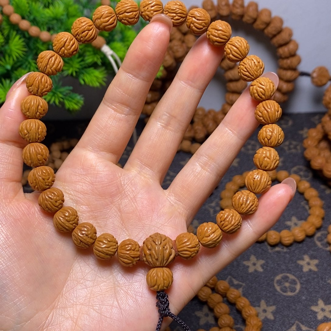 飘***贺桃核手串秦岭桃核