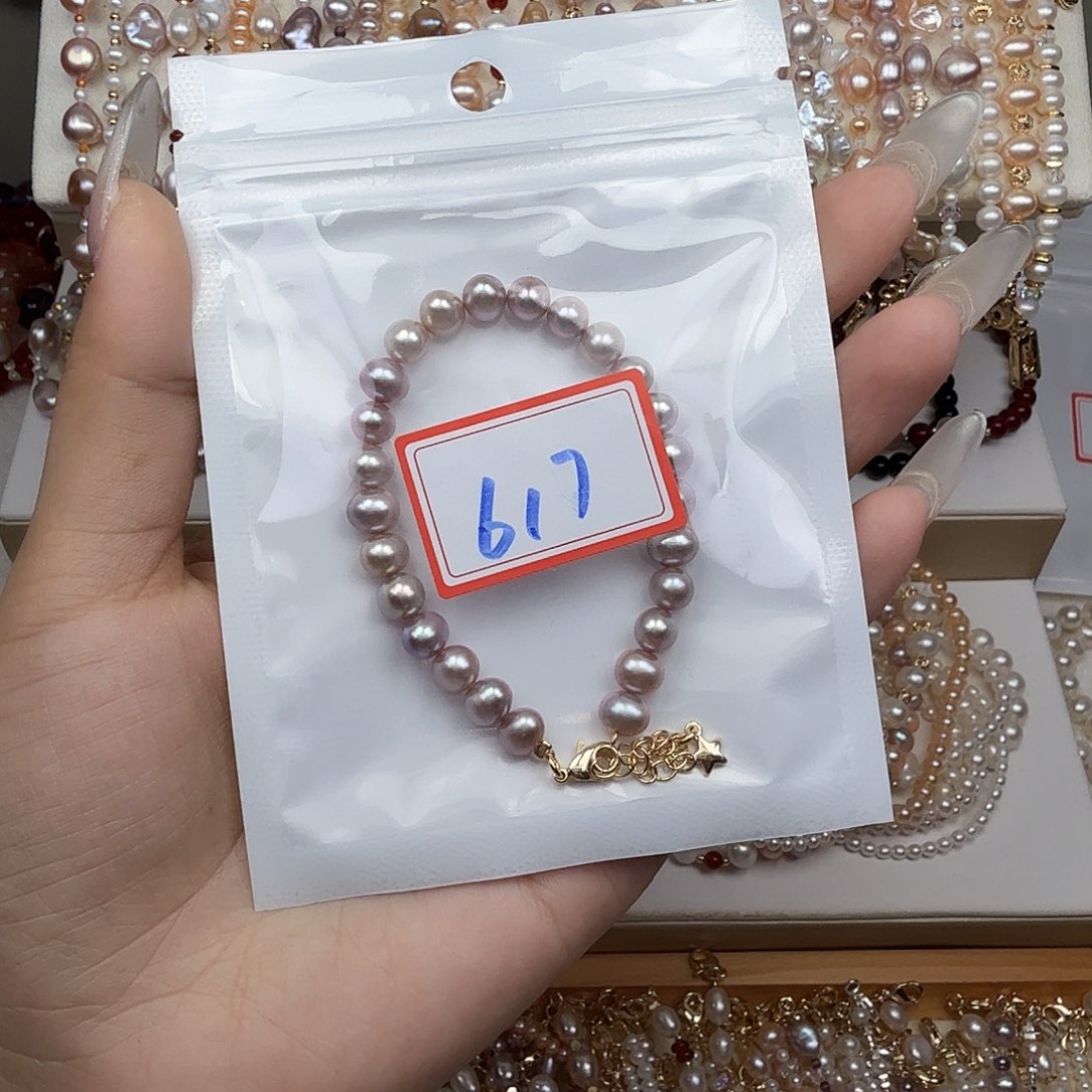受***点钛钢手绳淡水珍珠