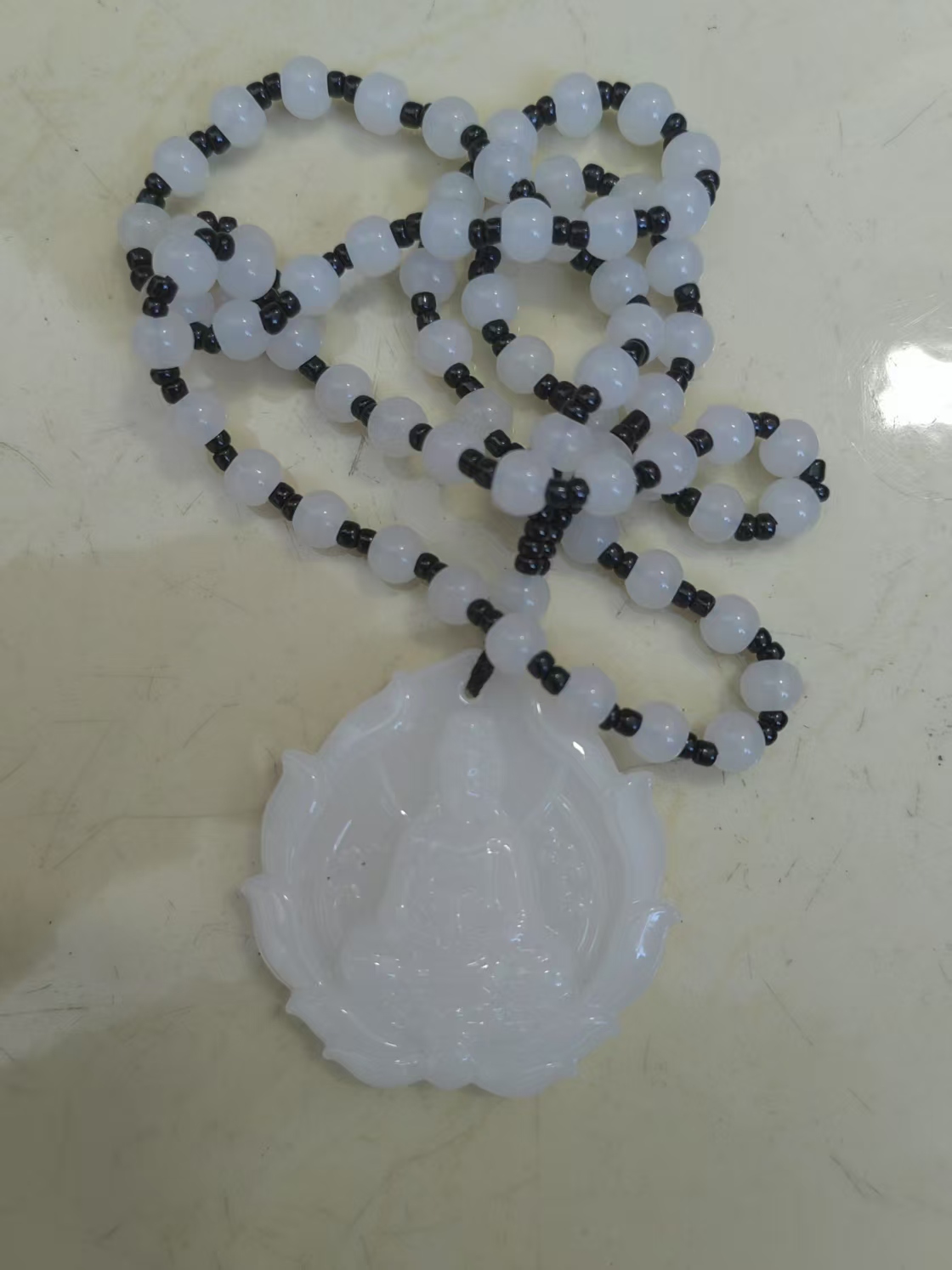 {抖音闪购}玉石白玉观音