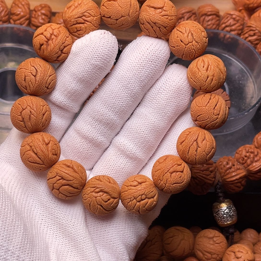 手串桃核金丝龙珠1.7