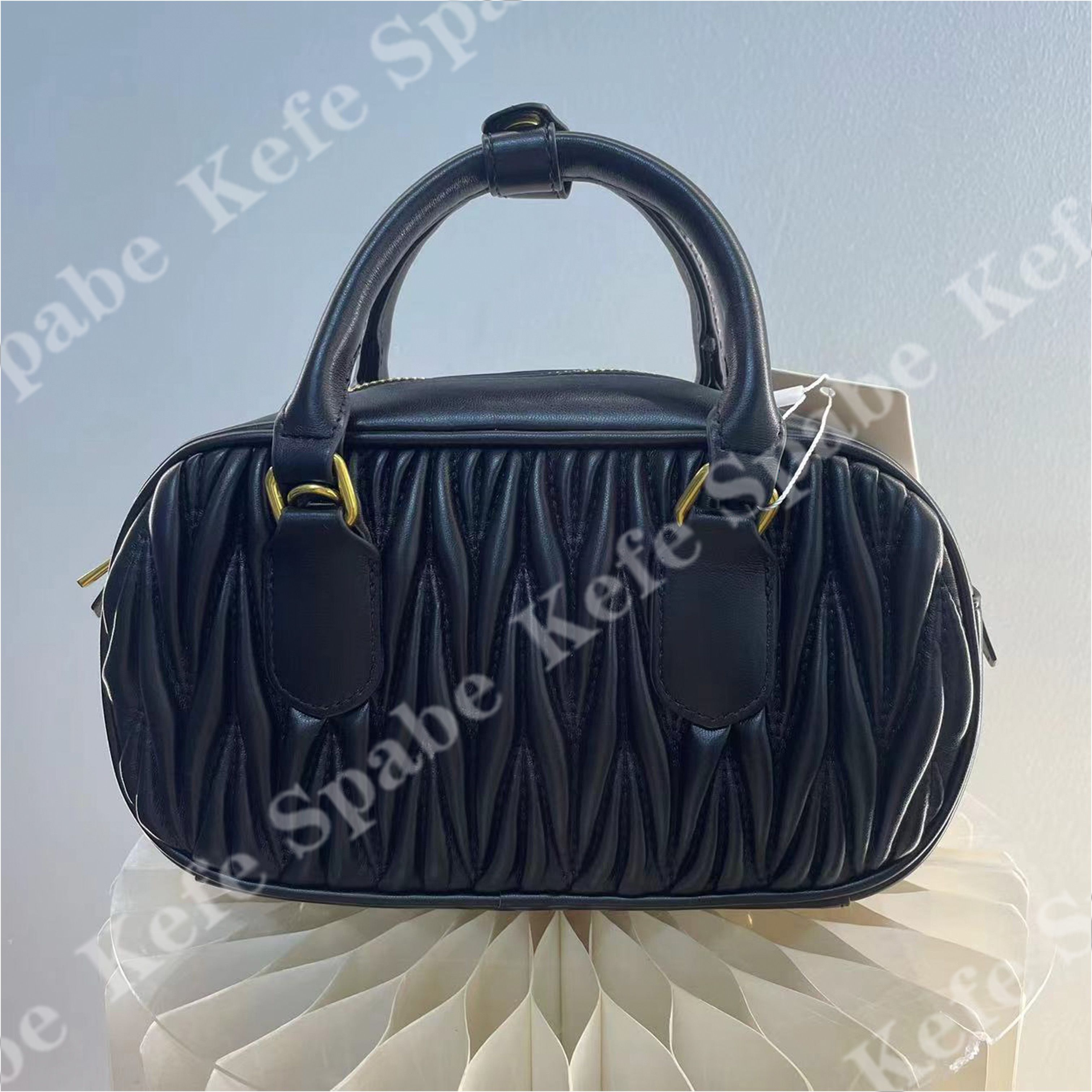 HM047 T25新款黑色褶皱保龄球手提斜挎包-1