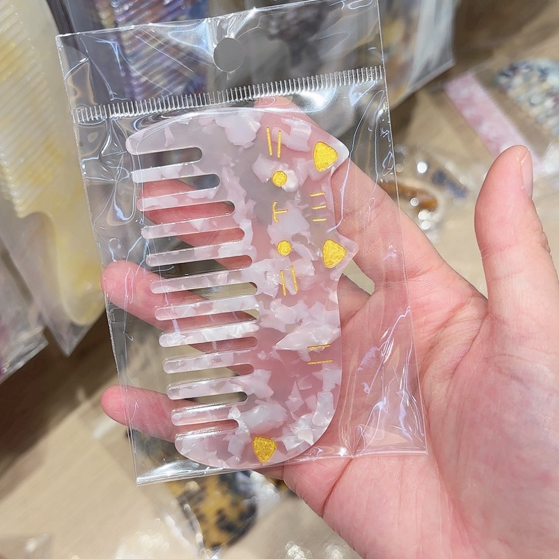 布艺非金属梳子一个