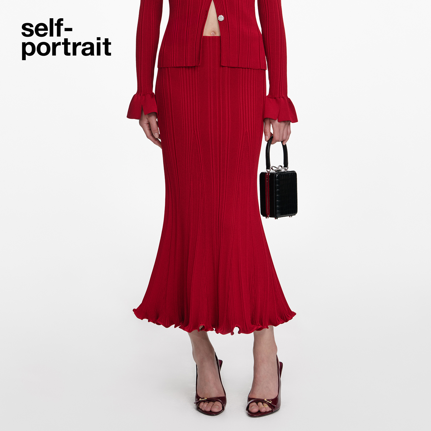 self-portrait 2026早春新款酒红色针织鱼尾裙半身裙中长裙