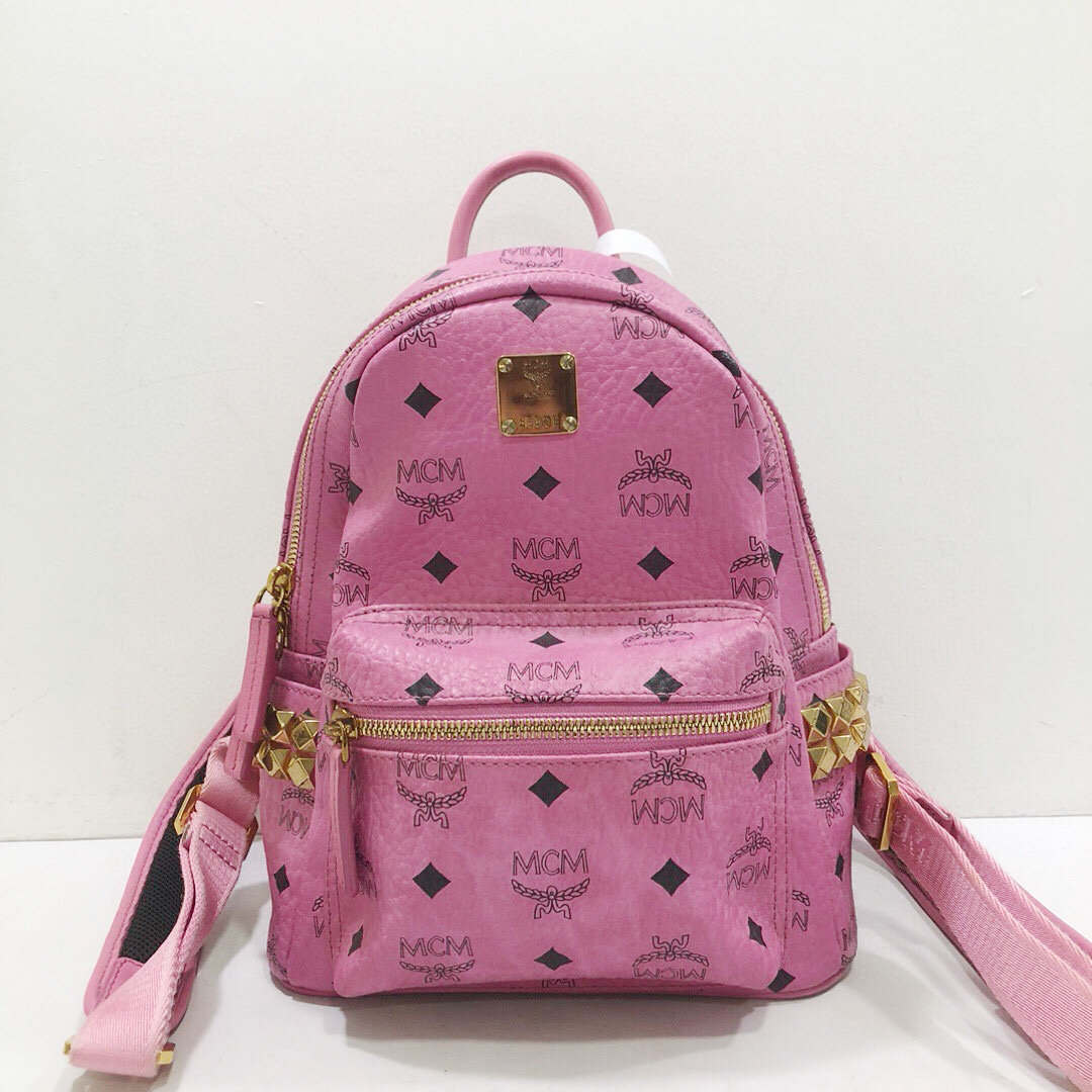 95新 MCM mcm全皮粉色老花双肩包