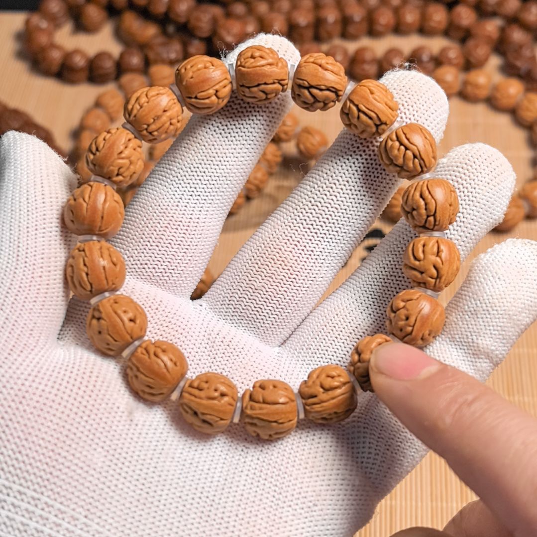 吊坠桃核肉纹大肠手串