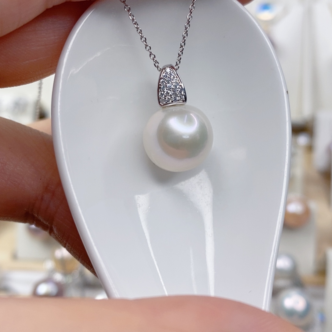 淡水珍珠吊坠(赠链)银S925镶嵌J****?