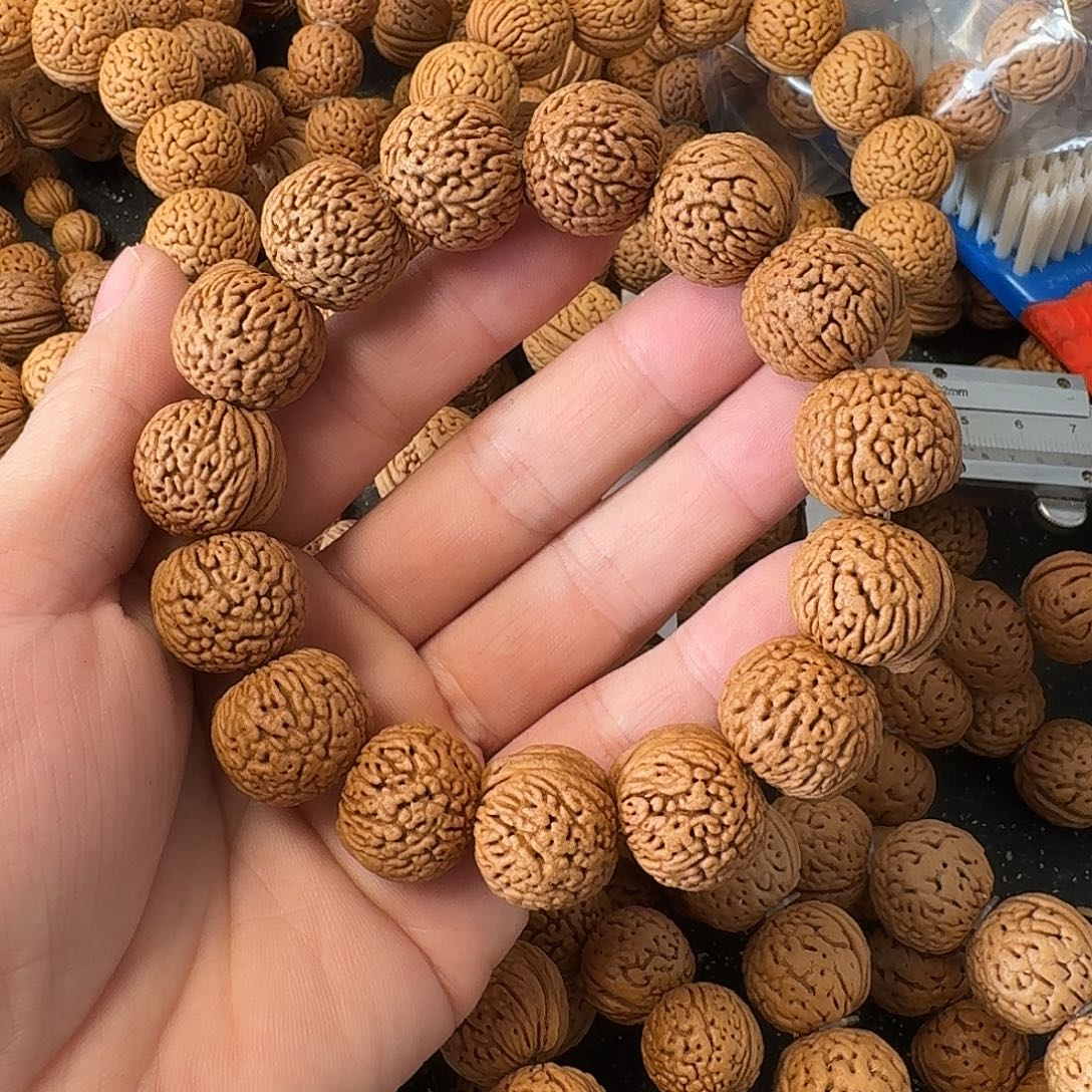 抗***鼻桃核吊坠龙鳞苹果手串